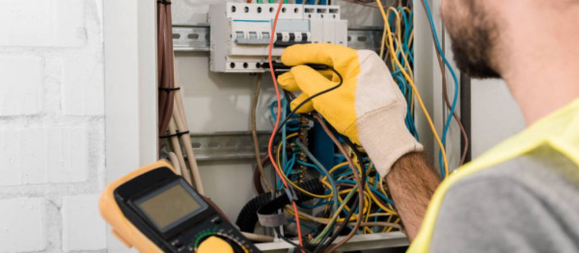 depositphotos_217089698-stock-photo-cropped-image-electrician-checking-electrical